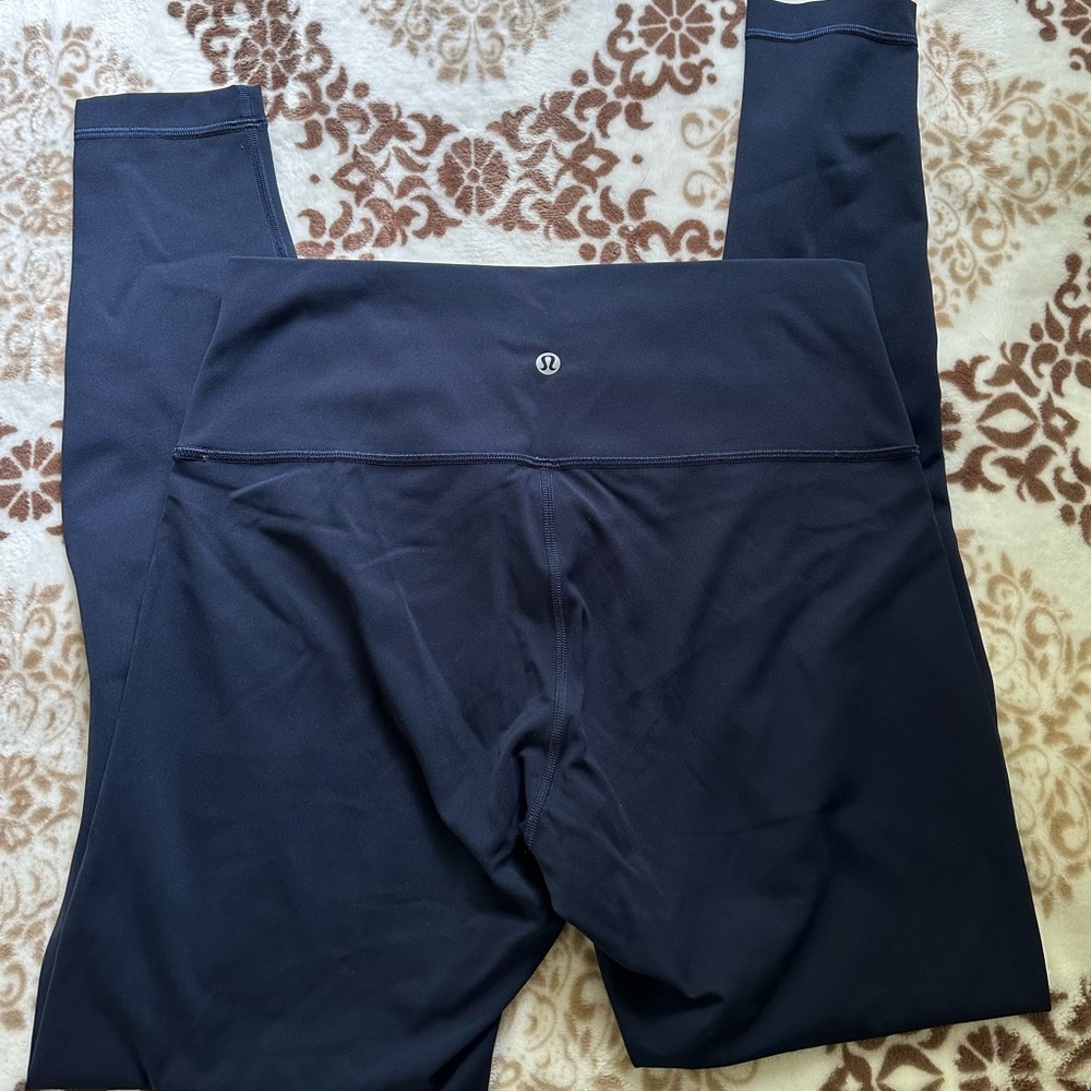Lululemon Wunder Under leggings. Dark blue color. Size 10.